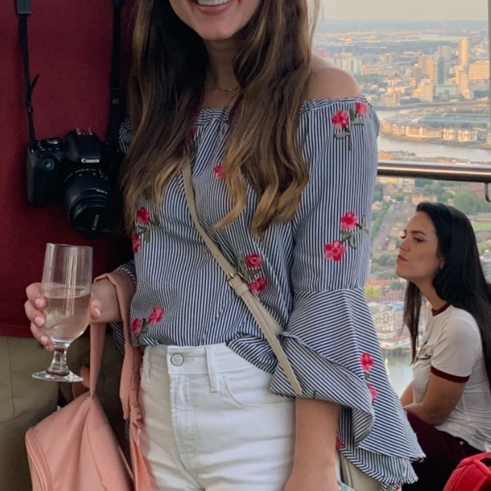Fun Black and white top with embroidered flowers